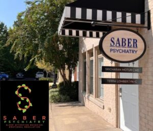 A Saber Psychiatry sign hangs outside the medical practice.