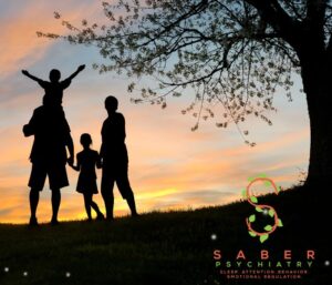 A family watches the sunset.