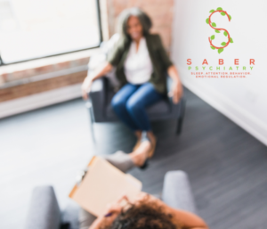 A person meets with a mental health professional.