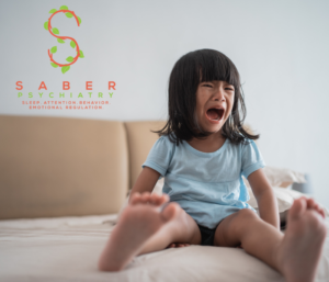 A young person is having an emotional outburst.